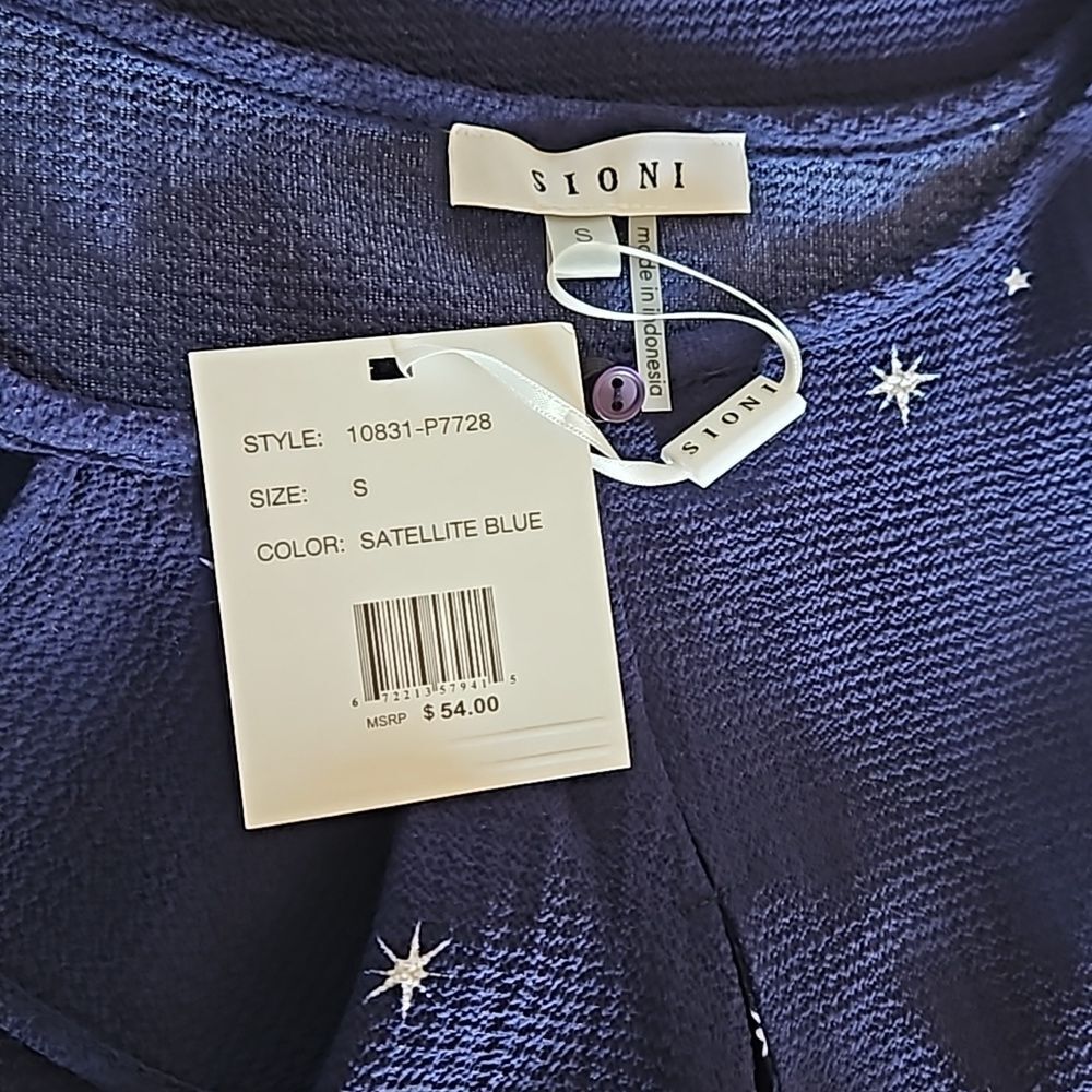 Sioni Sleeveless Ruffle Front Satelite Blue Top With White Stars size Small NWT